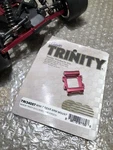 Trinity Losi Mini-t Red Anodized Rear Arm Mount Horizon New 1/18. Fixed Price $14.00.