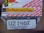 Schumacher U21456X = Upper Suspension Mount - Low: Sst (new). Fixed Price $9.00.
