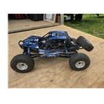 Axial RR10 Bomber 1:10 4WD Brushless Electric Rock Crawler Rtr Blue/black. Fixed Price $365.00.