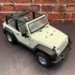 Welly 1996/2006 Jeep Wrangler Door Open Top 1:24 Scale White - W/box. Fixed Price $27.50.