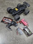 Traxxas Revo 1/10 Scale Original Brushed Rtr (clean) + New Batteries Charger. Fixed Price $622.99.