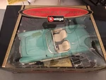 Burago 1957 Chevrolet Corvette 1:18 Scale Die Cast Model #3024 Turquoise/white. Fixed Price $10.00.