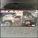 Traxxas Slash Team Amsoil Edition Scott Douglas / Mike Oberg Model 5805. Fixed Price $485.00.