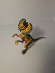 Dinosaur Toy Mini Figurine Dilophosaurus Poseable Figure. 6.5" Tall. Fixed Price $10.95.