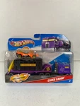 Hot Wheels 2011 Racing Rigs Caged Cargo With Hauler And. Fixed Price $19.95.