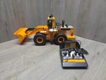 New Bright 290 The CAT992 Power Loader Tractor W/full Control Remote Work Center. Fixed Price $100.00.
