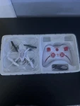 Syma X11C 4CH Quadcopter Drone W/ Camera & Remote Controller, White/red. Fixed Price $30.00.