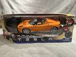 Tesla Rare Orange Roadster Remote Control Car (new In Sealed Box) Maxtech Toys. Fixed Price $400.00.