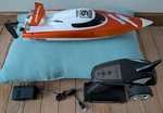 FT009 Ready-to-race Rc Speedboat + Accessories -- Orange. Fixed Price $85.00.