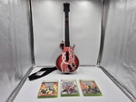 Guitar Hero Aerosmith XBOX360 Gibson Paul Wireless Controller With Games Lot. Fixed Price $149.99.