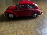 Vintage 1960S Volkswagen Battery Operated Red Metal Car Made Japan. Fixed Price $350.00.