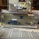 Greenlight 1961 Nissan Patrol Hard Top With Utility Trailer Blue & White 1/64. Fixed Price $7.80.