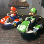 Set Of Super Mario Spin Out 2.5 Racer Kart & Luigi Toy Car. Fixed Price $14.99.