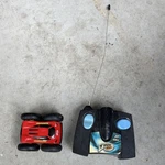 Tyco Rebound Remote Cars Red Blue Black With Controller. Fixed Price $40.00.