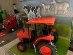 7"LONG New Ray Orange Kubota L6060 Tractor Cow, Sheeps, No Packaging # C40. Fixed Price $6.00.