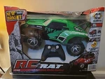 New Bright Rc Atv Rat Racing Green/black 1:15 Radio Control Remote Read. Fixed Price $40.00.