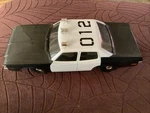 Vintage .049 Cox Toy Gas Engine Powered ADAM-12 Patrol Car Used Untested. Fixed Price $350.00.