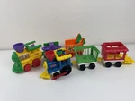 2 Vintage Fisher Price Little People Trains Toy Sets, Circus Has Sound. Fixed Price $24.99.